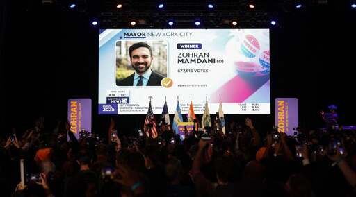 A screen shows New York City mayoral candidate Zohran Mamdani declared the winner during his election night event at the Brooklyn Paramount theater, Nov. 4, 2025. (Angela Weiss /AFP via Getty Images)